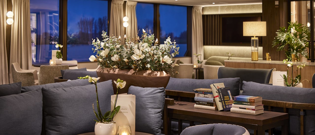 The Ruby Deck Bar Lounge has floor-ceiling windows, comfortable seating, dance floor and a piano